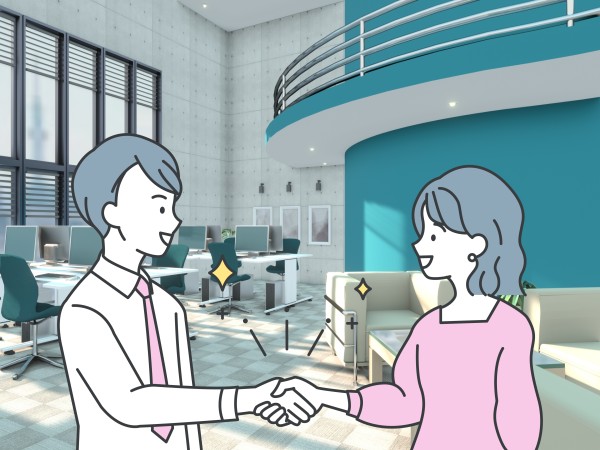 お客様にお部屋をご紹介する不動産営業マン